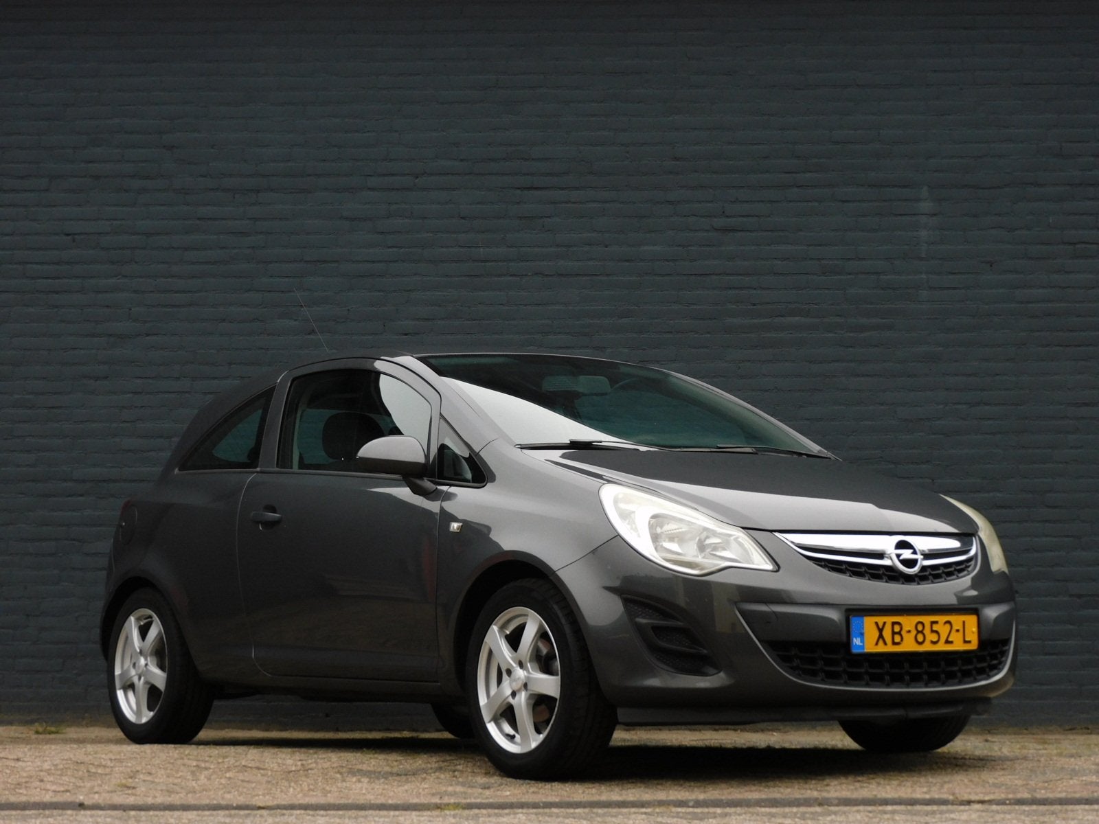 Opel Corsa 1.0-12V Edition NIEUWE DISTRIBUTIE! NET ONDERHOUD, Voorwielaandrijving, Euro 5, Zwart, Elektrische ramen