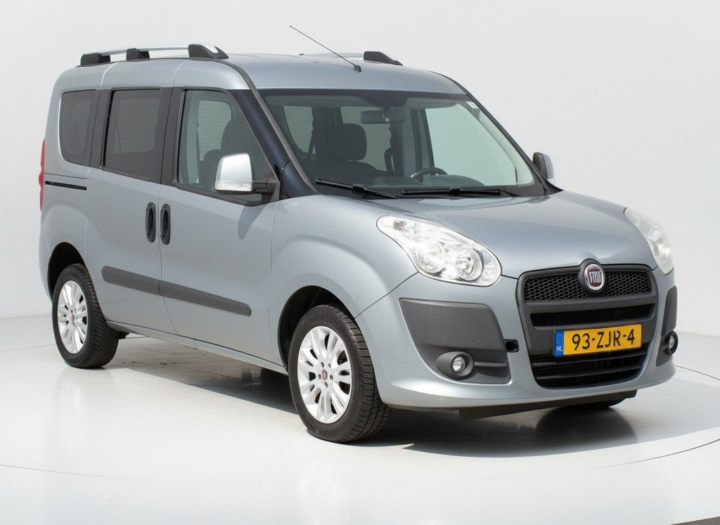 Fiat Doblò 1.4 T-Jet Emotion|Cruise|Clima|Trekhaak|Schermpj, Auto's, Fiat, Voorwielaandrijving, Euro 5, Stof, Gebruikt