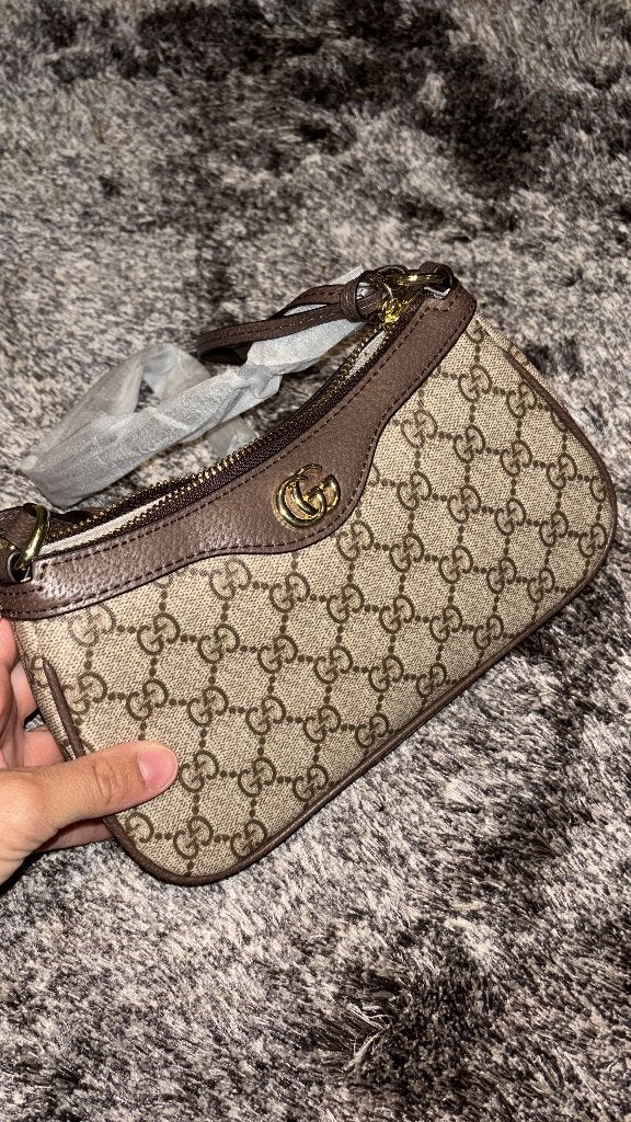 Bruine tas met g logo, Ophalen of Verzenden, Nieuw, Bruin