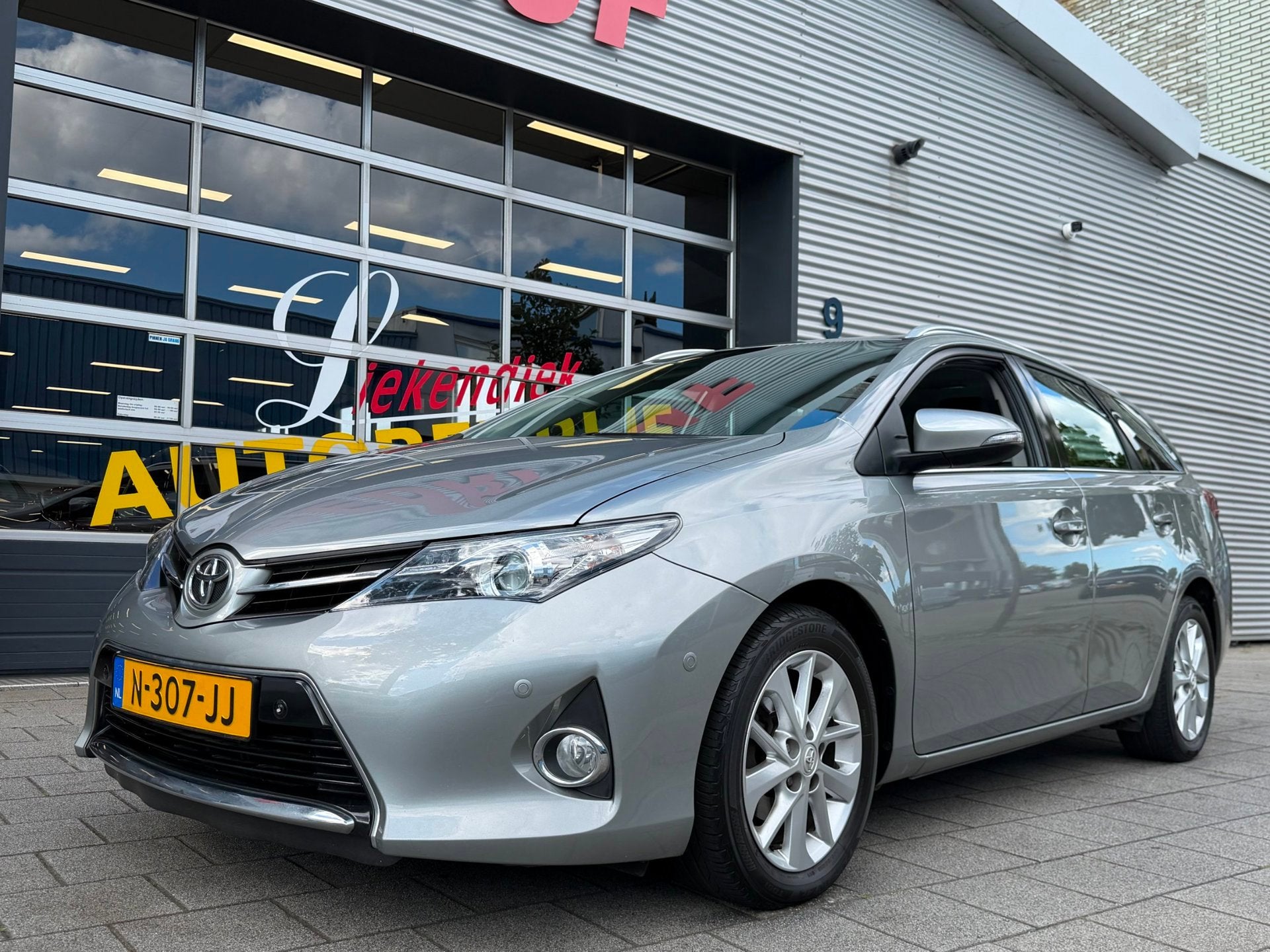 Toyota Auris Touring Sports 1.3 Aspiration - Airco I Xenon /, Auto's, Toyota, Voorwielaandrijving, Euro 5, Gebruikt, Zwart