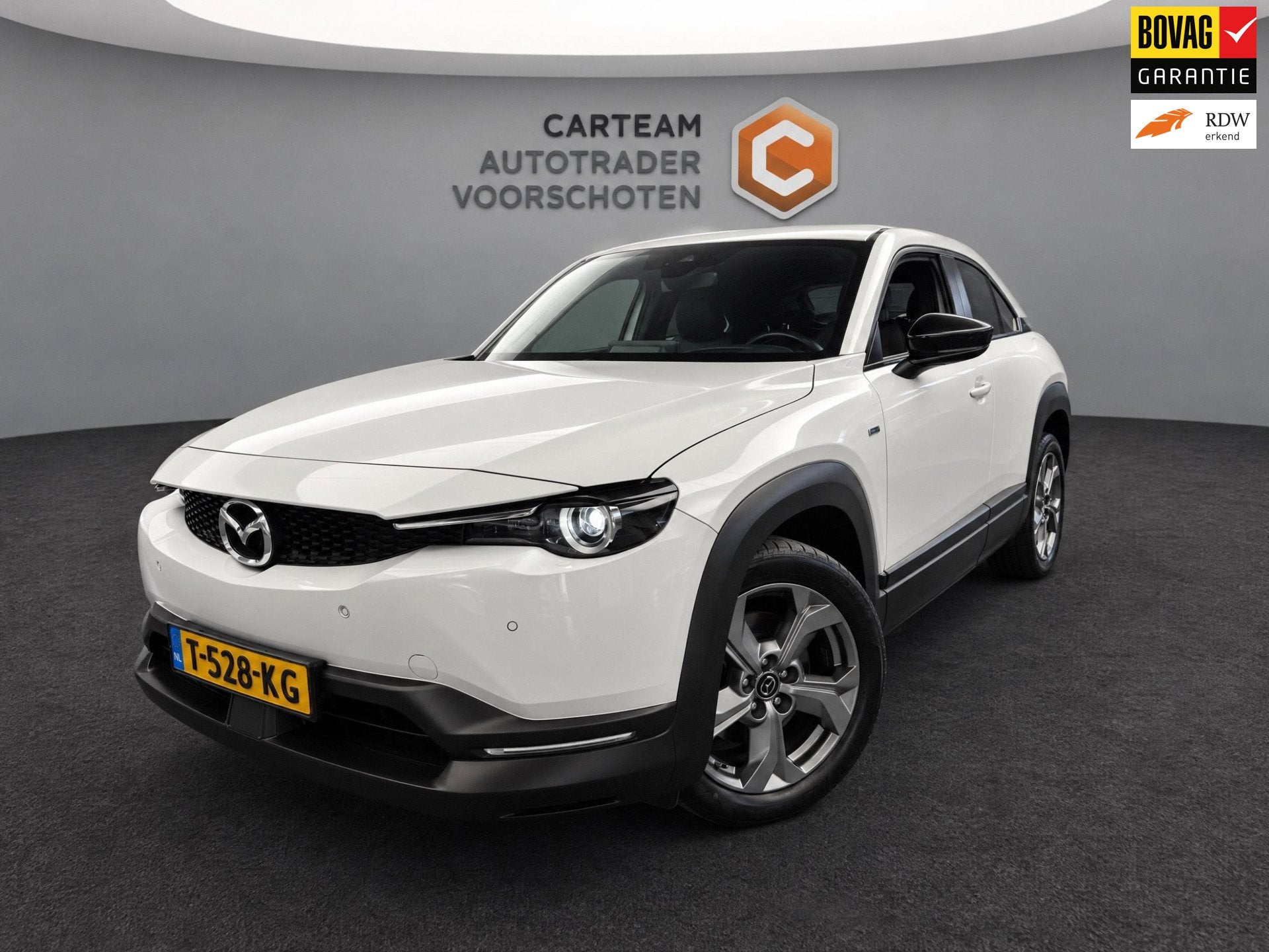 Mazda MX-30 E-SkyActiv EV 145 Exclusive-line 36 kWh |HUD|, Auto's, Stof, Gebruikt, Zwart, 35 kWh
