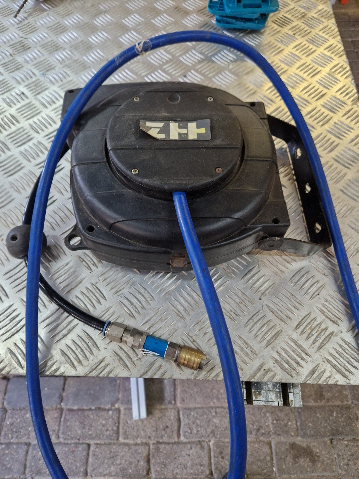 Slanghaspel voor compressor, compleet en gebruiksklaar, Ophalen