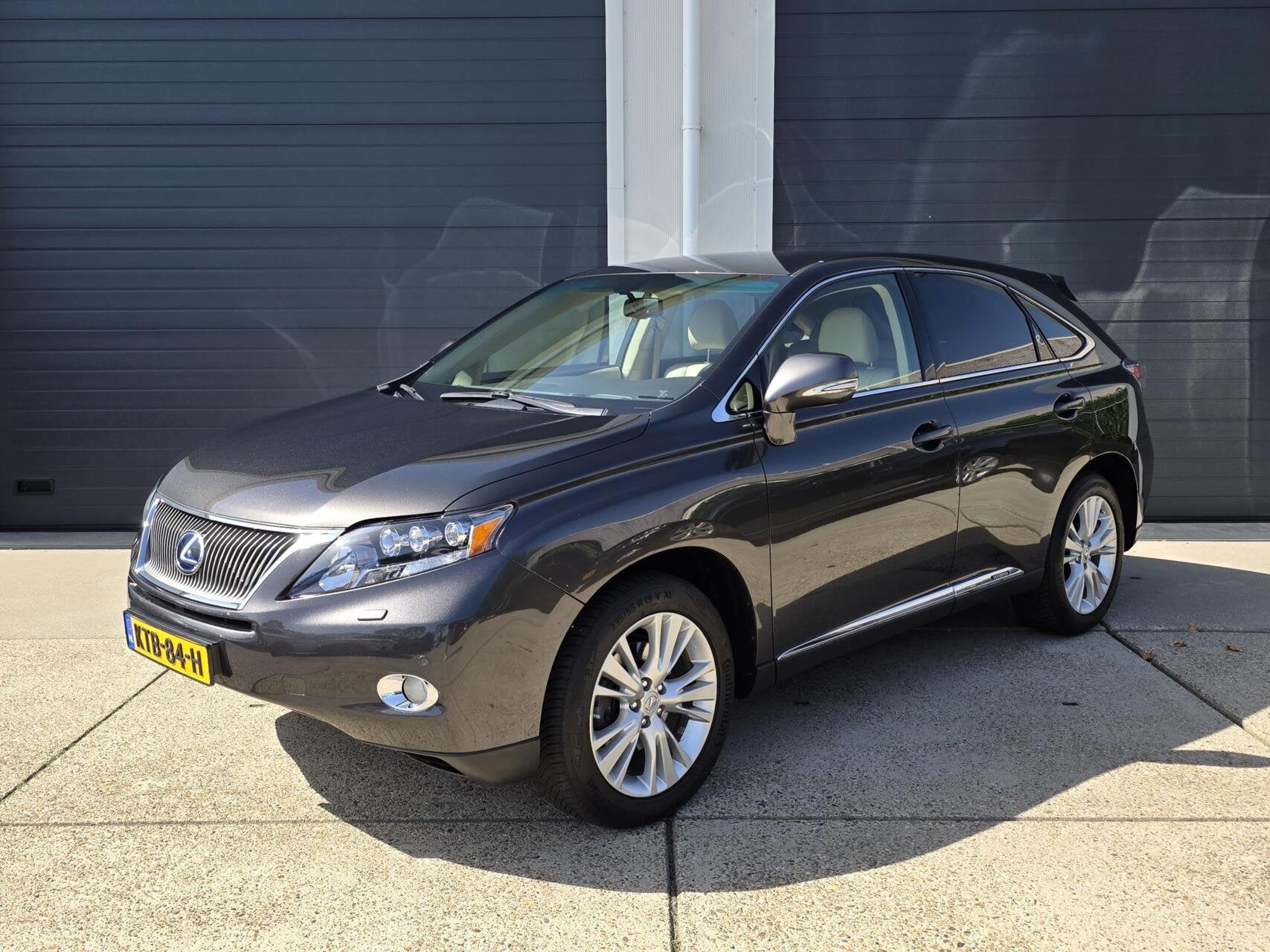 Lexus RX 450h 4WD|Mark-Levinson|1e eigenaar|2 JAAR GARANTIE, Auto's, Automaat, Dealer onderhouden, Beige, Leder