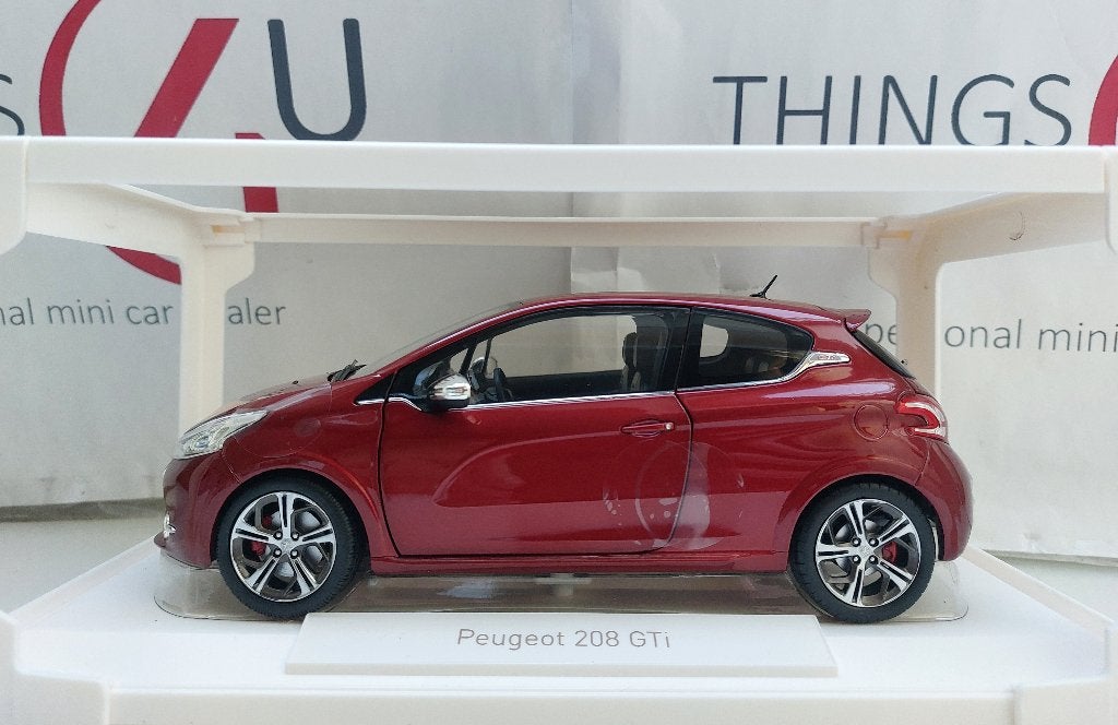 Norev 1:18 Peugeot 208 GTi 2013 Rubis Red nieuw in doos, Ophalen of Verzenden, Nieuw, Auto, Norev