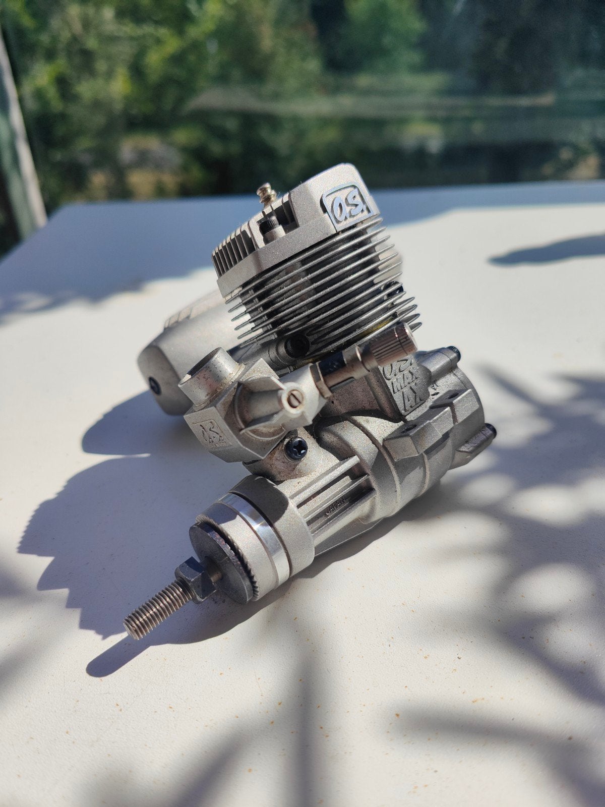 Nieuwe O.S. MAX 55AX Nitro motor inc 2 props en Enya #4, Ophalen of Verzenden, Nieuw, Nitro