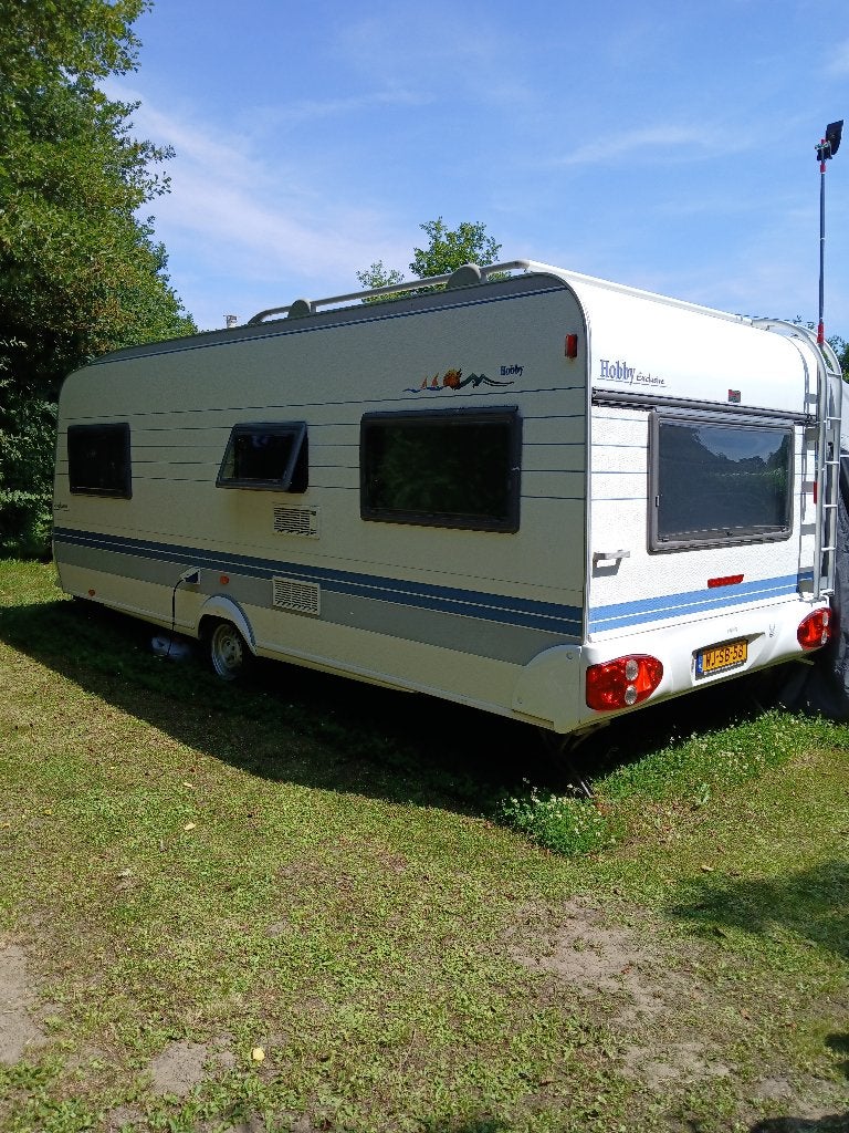 Caravan Hobby 560 UL Exclusive van 2001, Caravans en Kamperen, Rondzit, Hobby, Particulier, 5 tot 6 meter