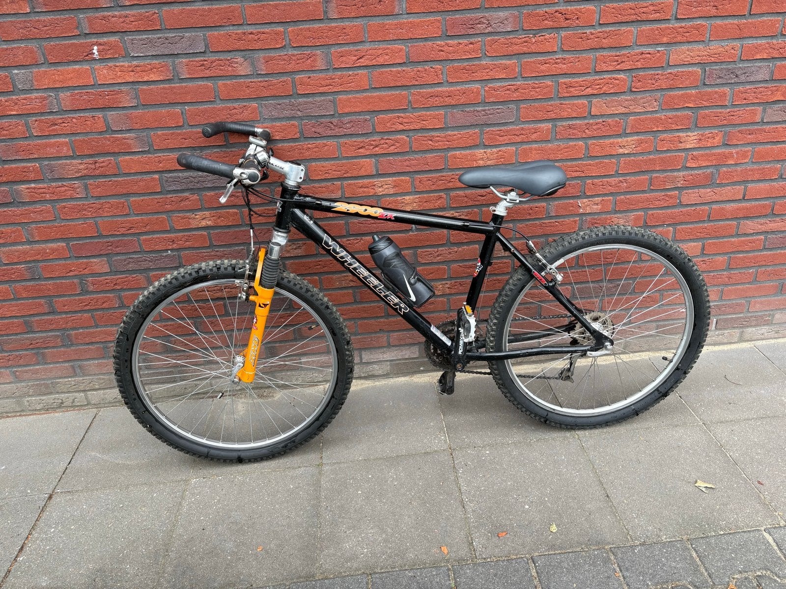 Wheeler Mountainbike - Zwart met Oranje Vering, Gebruikt, Hardtail, 53 tot 57 cm, Ophalen