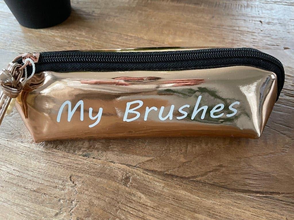 Brushes zakje, Gehele gezicht, Ophalen of Verzenden, Zo goed als nieuw, Goud