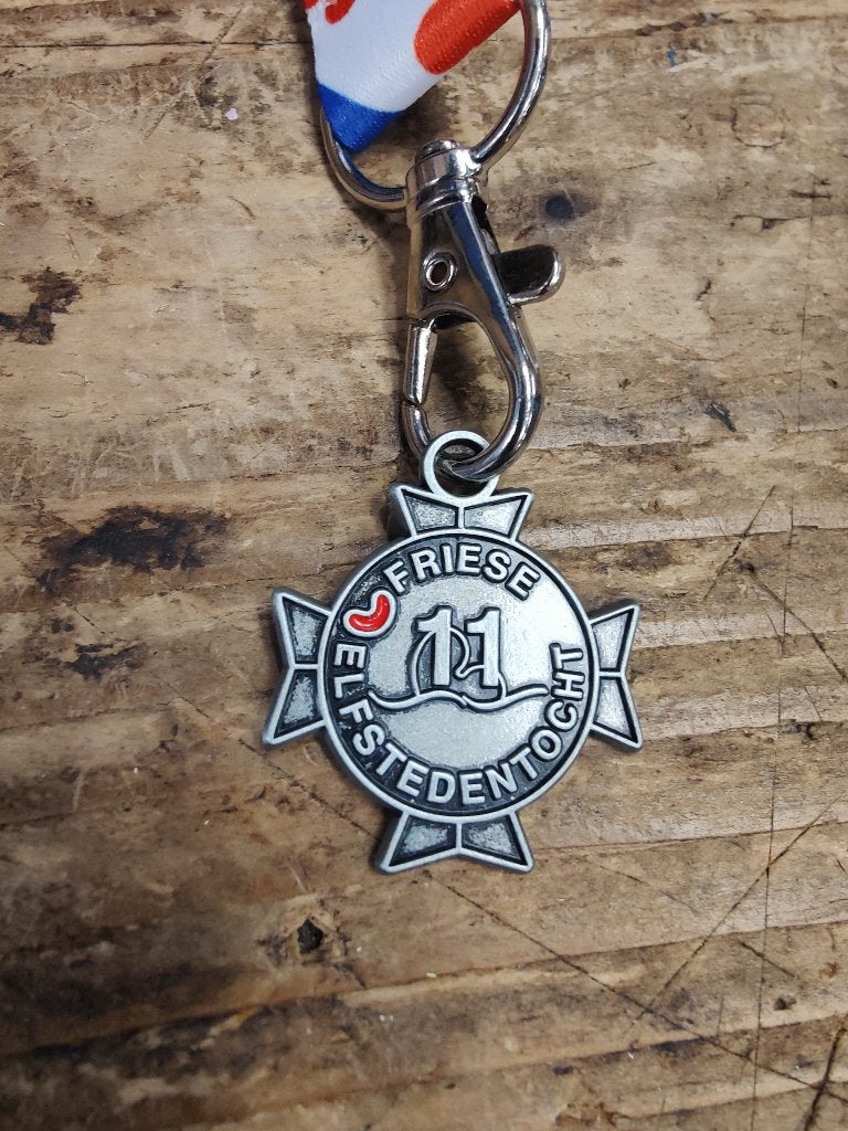 Friese elfstedentocht kruisje medaille, Ophalen of Verzenden, Overige materialen