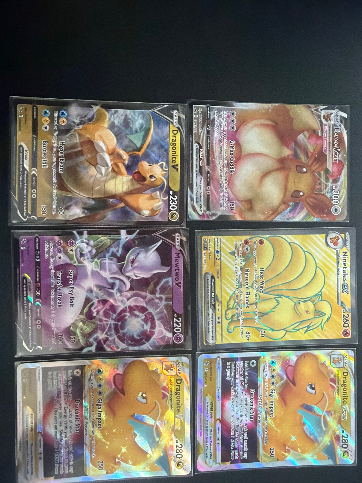 Pokémon Kaarten Collectie: Eevee VMAX, Dragonite VSTAR, Mewt, Ophalen of Verzenden, Zo goed als nieuw, Meerdere kaarten, Foil