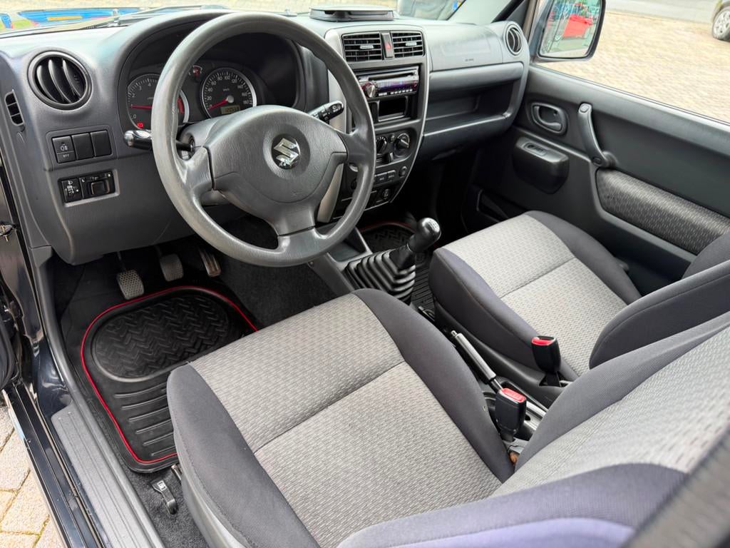 Suzuki Jimny 1.3 JLX 4x4, Airco, NAP, Auto's, Suzuki, Zwart, 4 stoelen, Zwart, Bedrijf