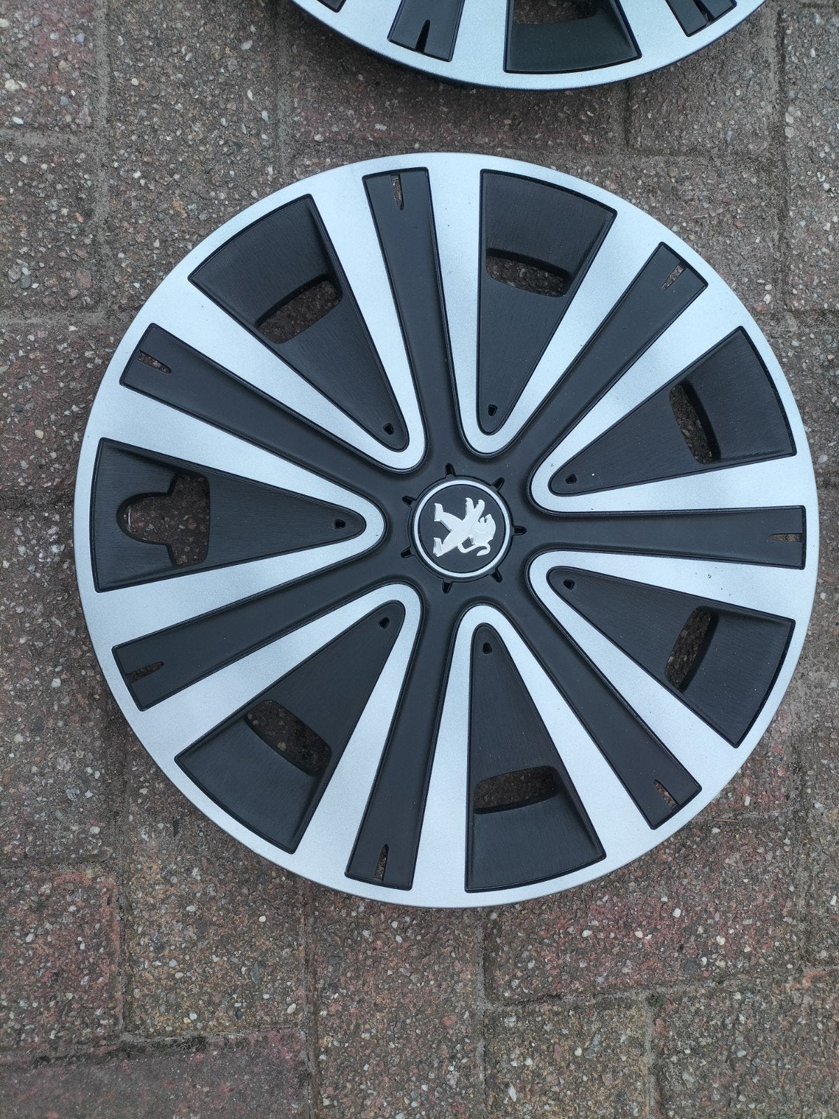 Originele peugeot wieldop NATEO 15" Peugeot Partner Tepee, Auto diversen, Wieldoppen, Ophalen of Verzenden, Zo goed als nieuw