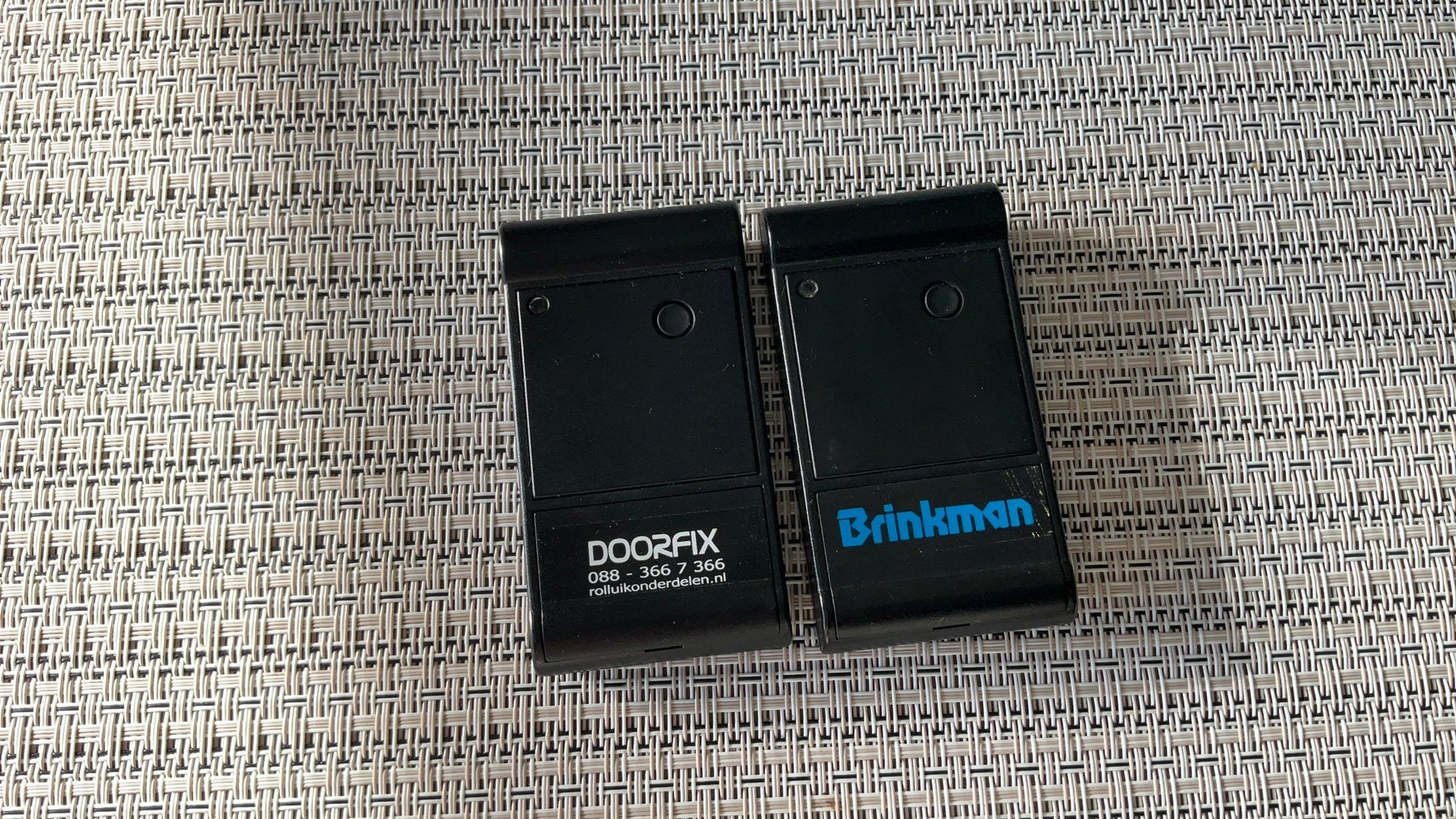 Te koop garagepoort afstandsbedieningen, Ophalen, Gebruikt