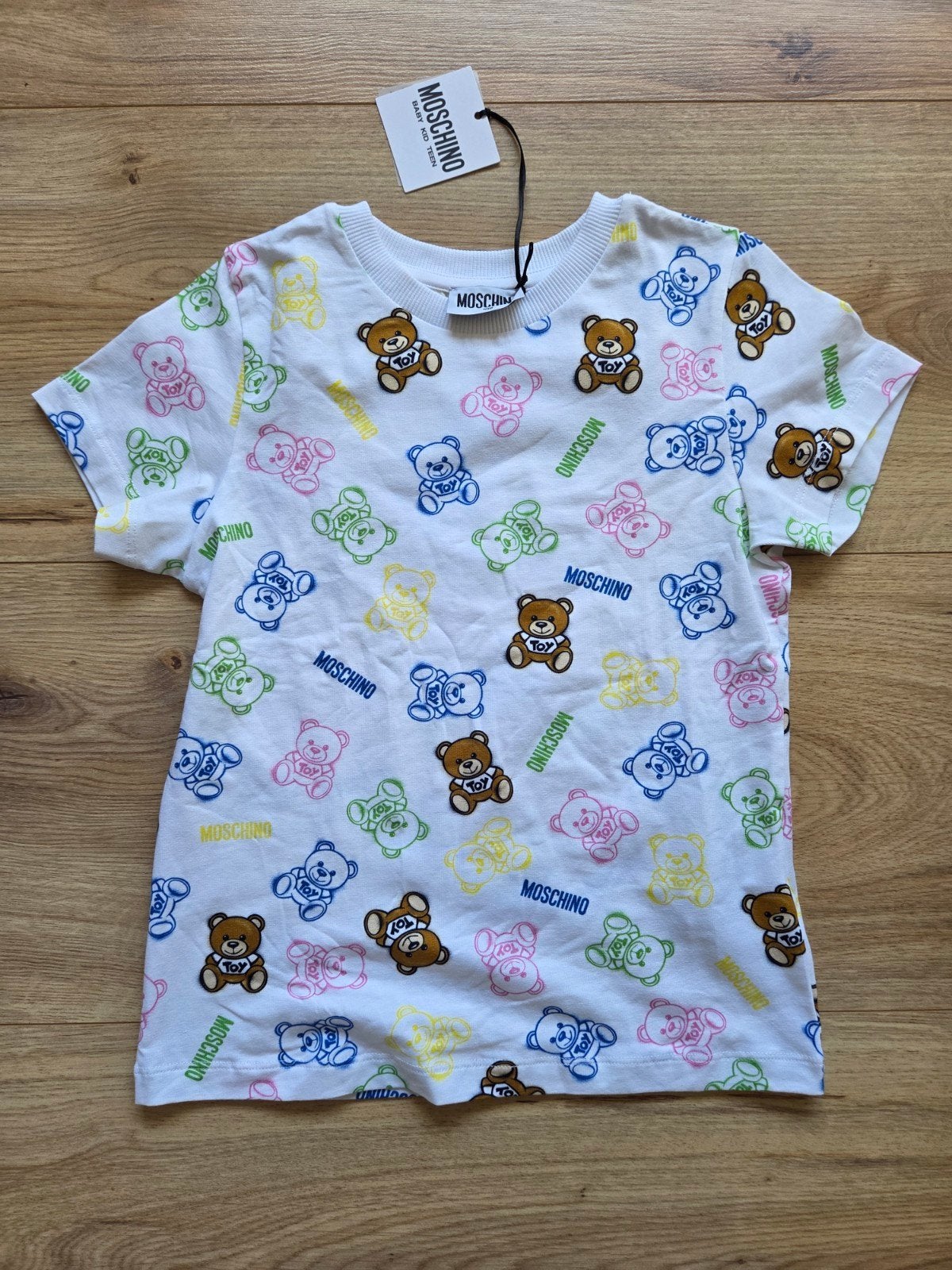 Tshirt Moschino, maat 6. Nooit gedragen, Moschino, Meisje, Nieuw, Ophalen of Verzenden