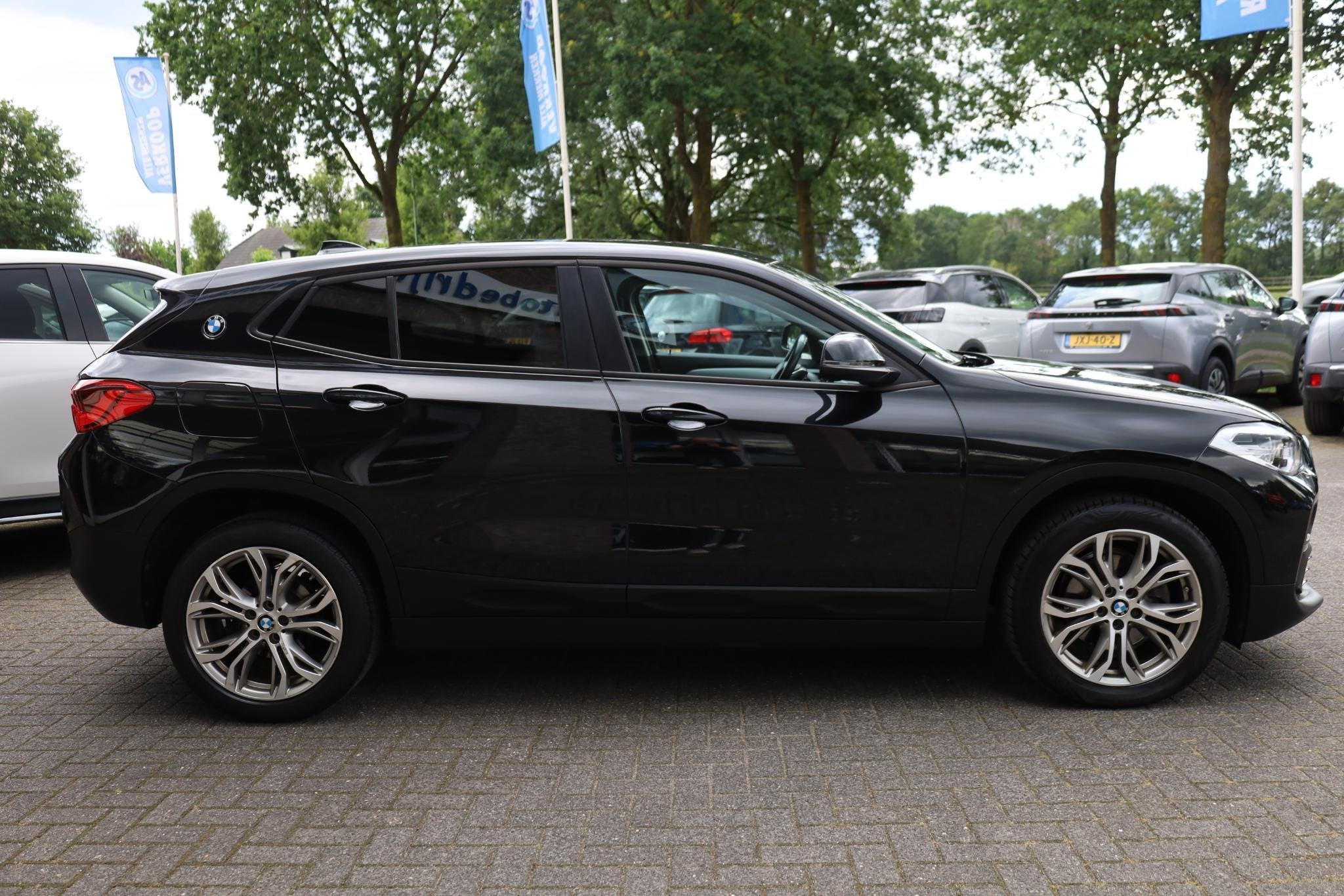 BMW X2 sDrive 18i Lefhebber Edition STOELVERW. ELEC-KLEP CRU, Gebruikt, Euro 6, Zwart, 3 cilinders