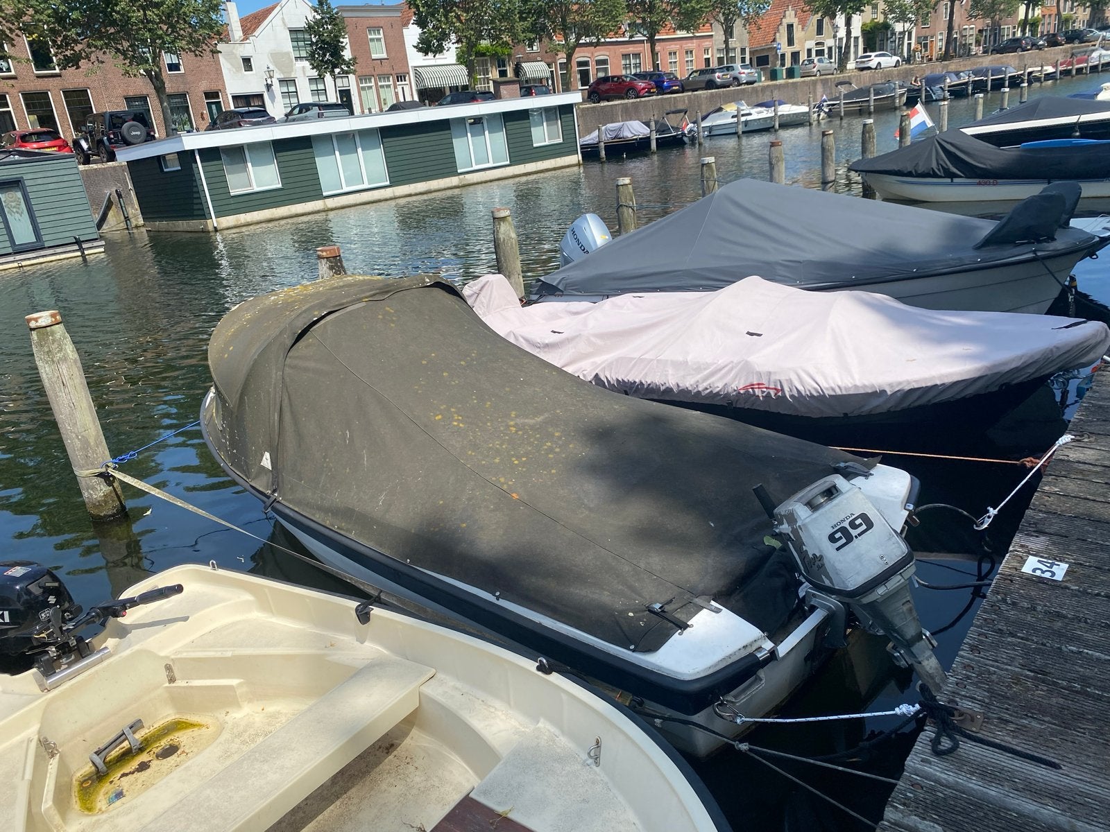 Stabiele polyester boot met buitenboordmotor, Gebruikt, Afdekzeil, Buitenboordmotor, Ophalen of Verzenden