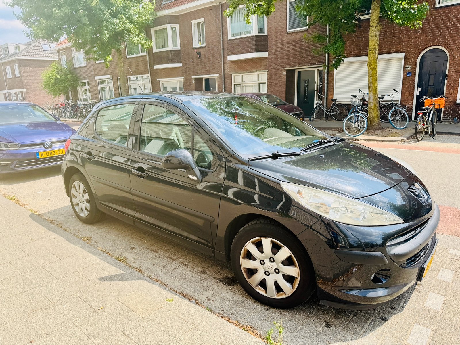 Peugeot 207 1.4 16V 5DRS 2006 Zwart, Auto's, Peugeot, Voorwielaandrijving, 1360 cc, 4 cilinders, Origineel Nederlands