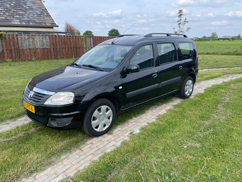 Dacia Logan 1.6 16V MCV 77KW 5P 2009 Zwart, Auto's, Stof, Zwart, 4 cilinders, 635 kg