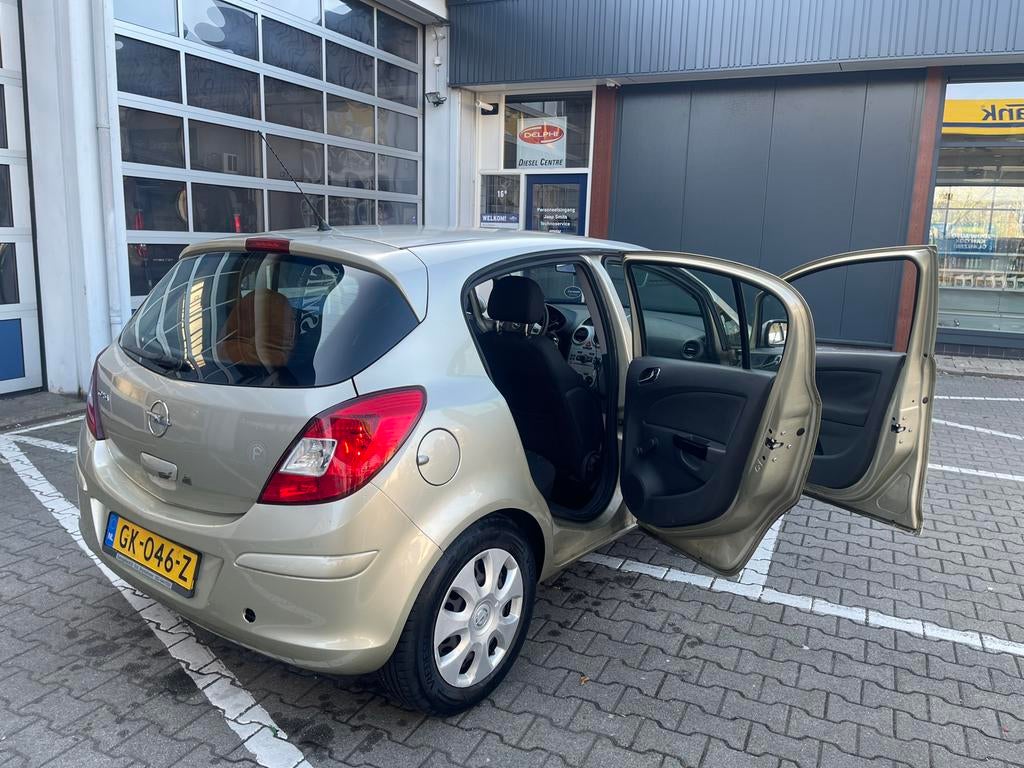 Opel Corsa 1.2 16V 5D 2009, Auto's, Voorwielaandrijving, 1229 cc, 49 €/maand, Handgeschakeld