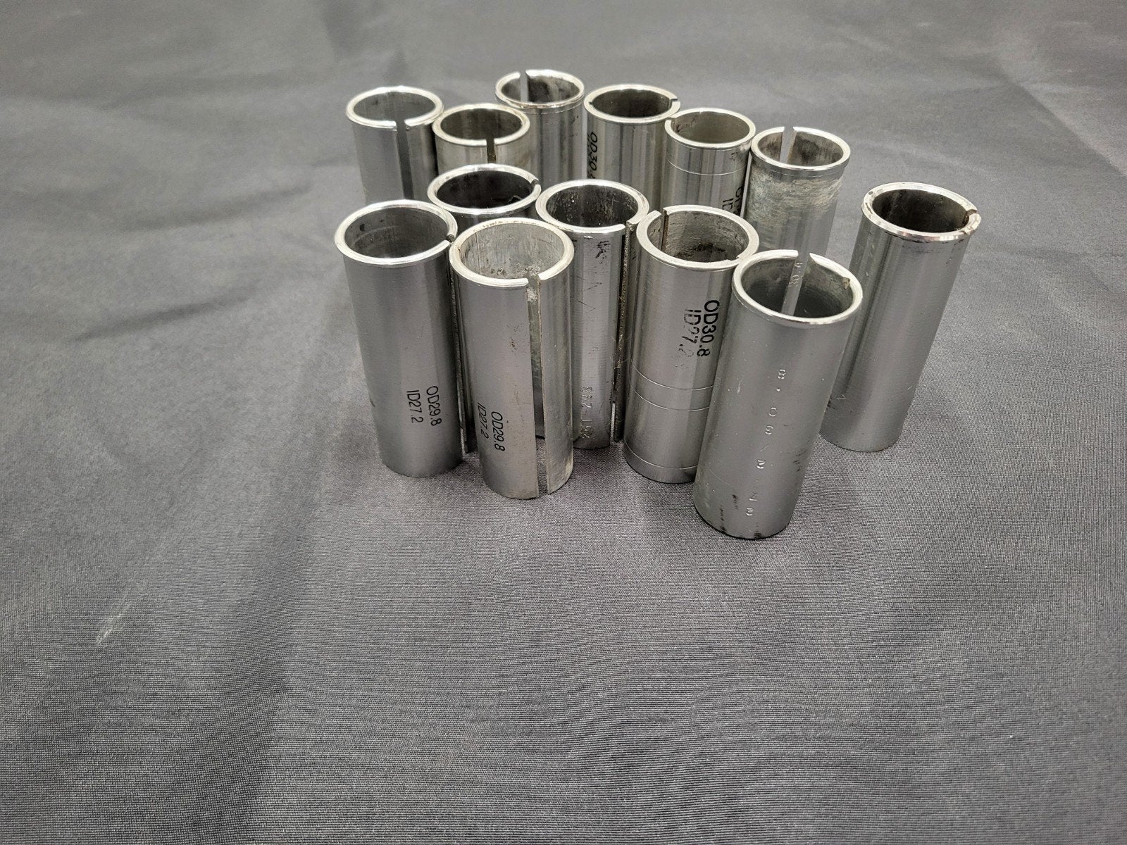 zadelpen pasbussen/adapters / seatpost shims, Fietsen en Brommers, Gebruikt, Overige typen, Ophalen of Verzenden, Aluminium