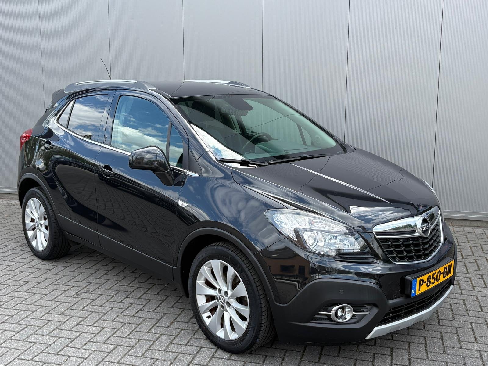 Opel Mokka 1.4T 140PK Automaat Cosmo Trekhaak/Camera/Parkeer, Auto's, 15 km/l, Gebruikt, Euro 6, Leder en Stof