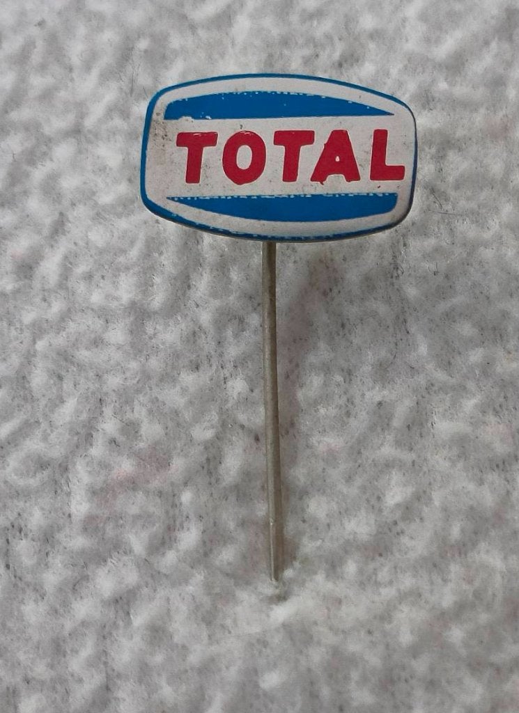 Speldje Total, Ophalen of Verzenden, Zo goed als nieuw, Merk, Speldje of Pin