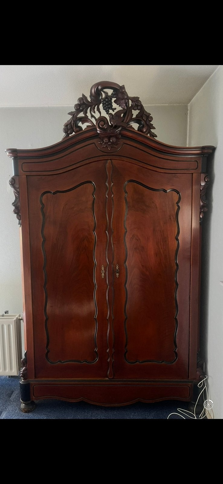 Antiek kast druiventros, Ophalen
