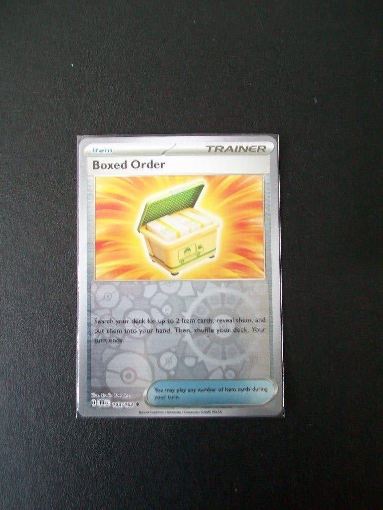 2719: Nieuwe Pokemonkaart holofoil BOXED ORDER (143/162), Verzenden, Nieuw, Losse kaart, Foil