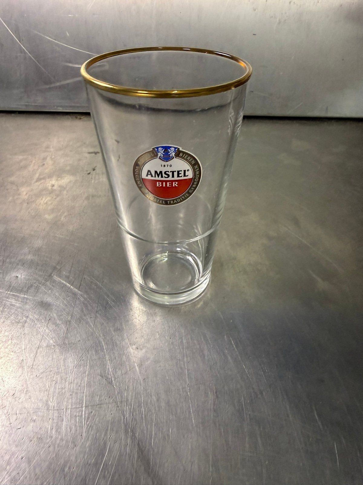 12 bier glazen amstel   nieuw in doos Meerdere dozen, Ophalen of Verzenden, Zo goed als nieuw, Glas of Glazen, Amstel