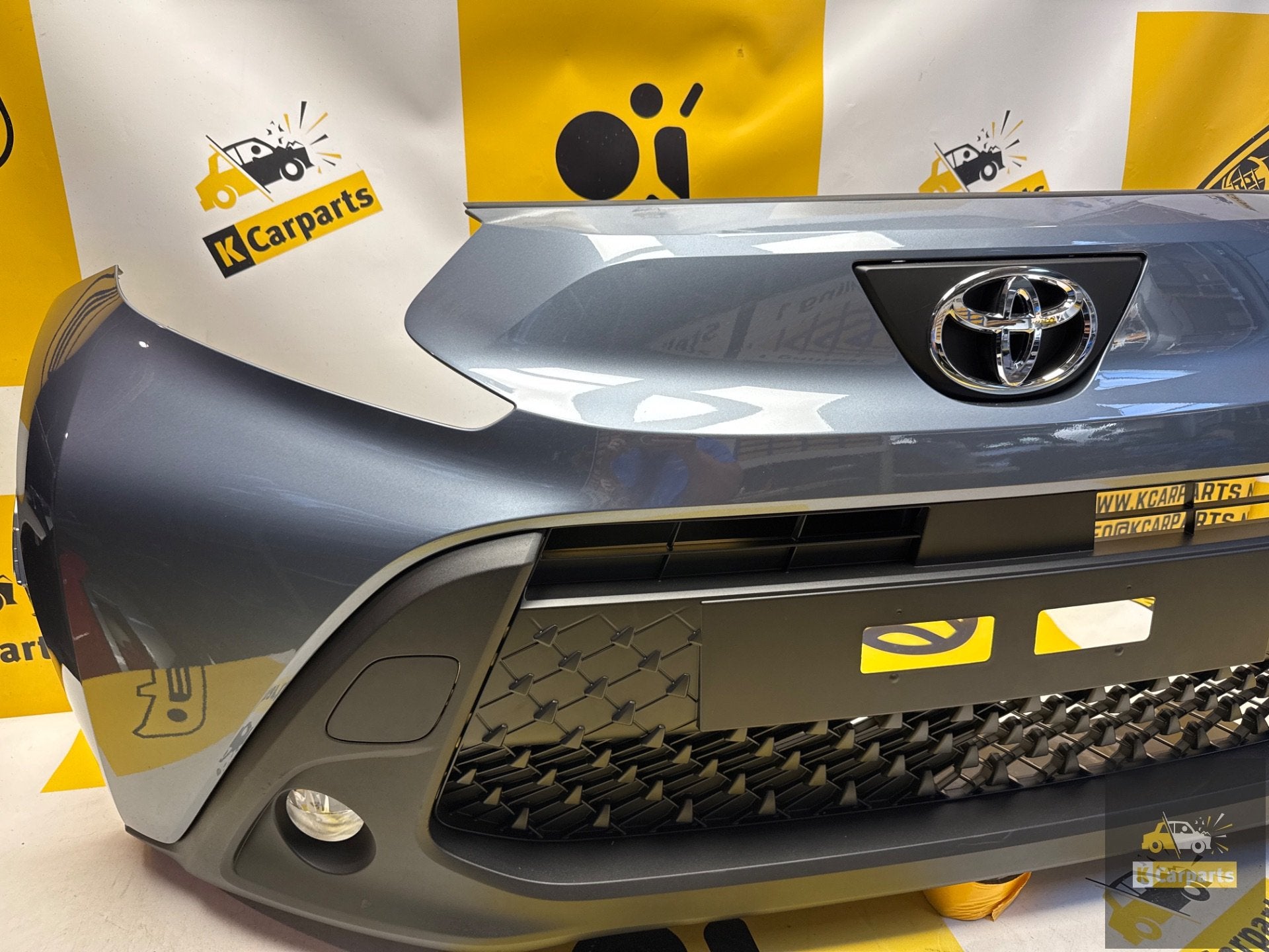 Toyota Aygo X Voorbumper origineel Compleet 52119-OH190, Info@toyota.co.jp, Gebruikt, Voor, Toyota Motor Corporation