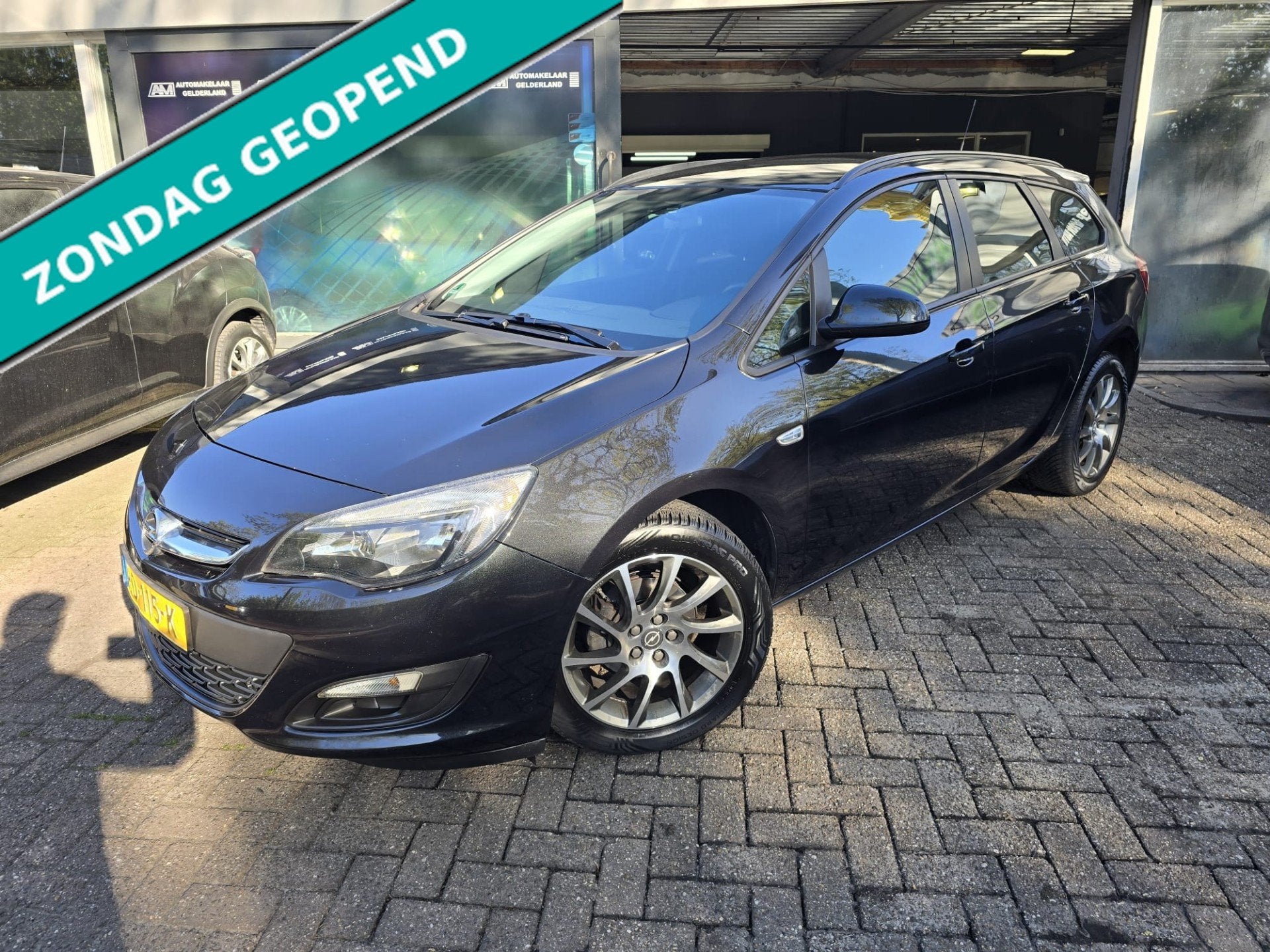 Opel Astra Sports Tourer 1.4 Turbo Edition | AUTOMAAT | 3/6, Stof, Gebruikt, 4 cilinders, Zwart