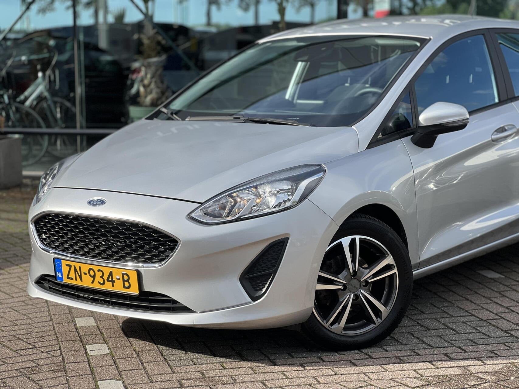 Ford Fiesta 1.1 Trend Airco cruise Navi AllSeason NAP, Auto's, Voorwielaandrijving, Dealer onderhouden, Stof, Gebruikt
