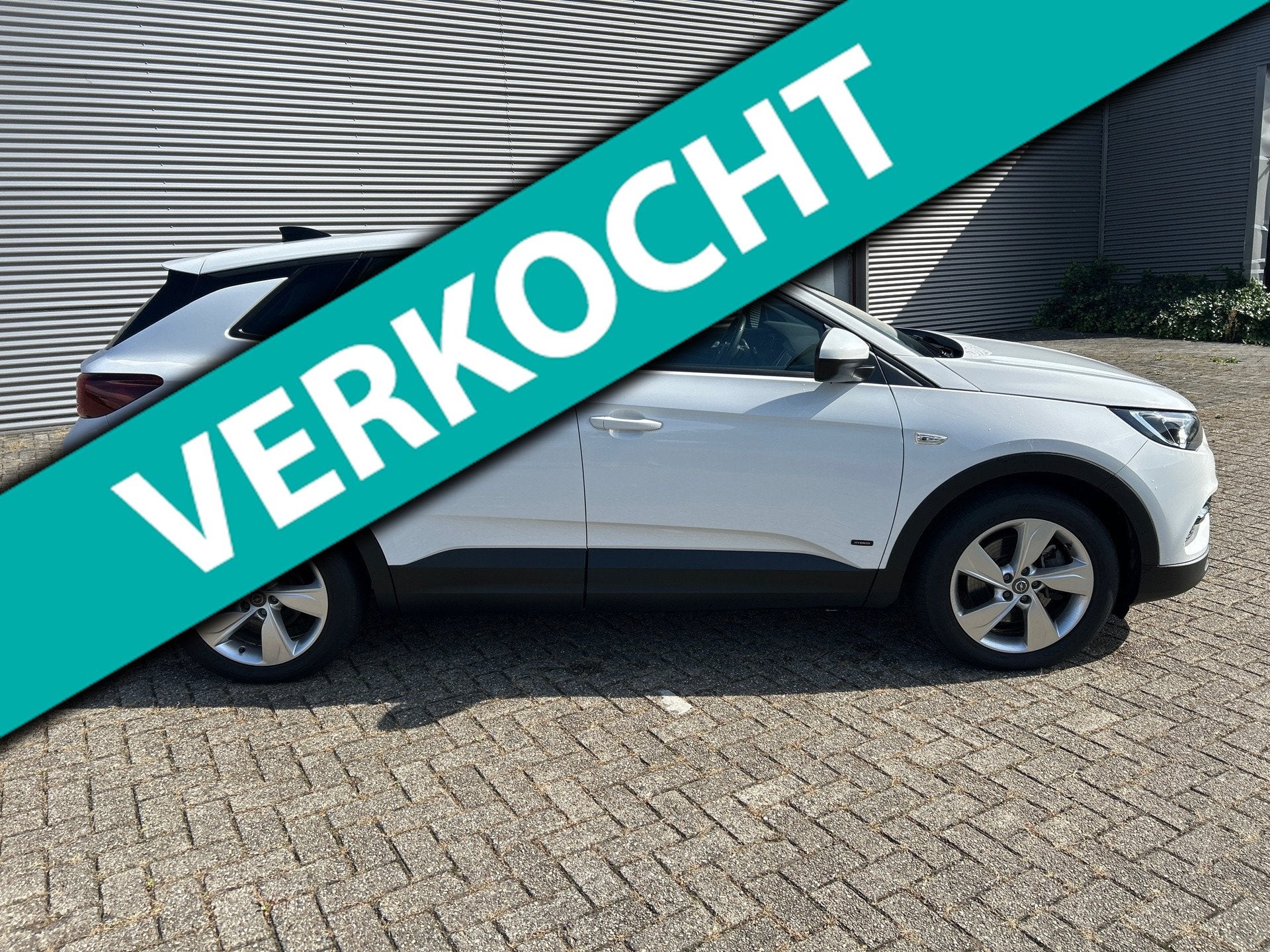 Opel GRANDLAND X 1.6 Turbo Hybrid Business Edition Met afnee, Auto's, Dealer onderhouden, Stof, 4 cilinders, 181 pk