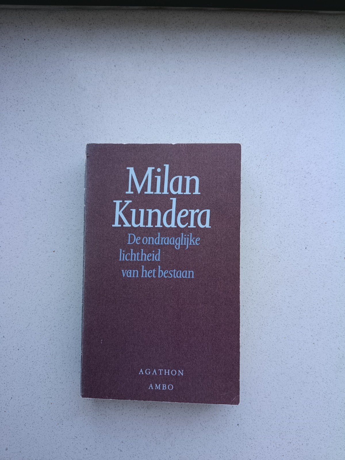 De Ondraaglijke Lichtheid van het Bestaan - Milan Kundera, Boeken, Ophalen of Verzenden, Gelezen