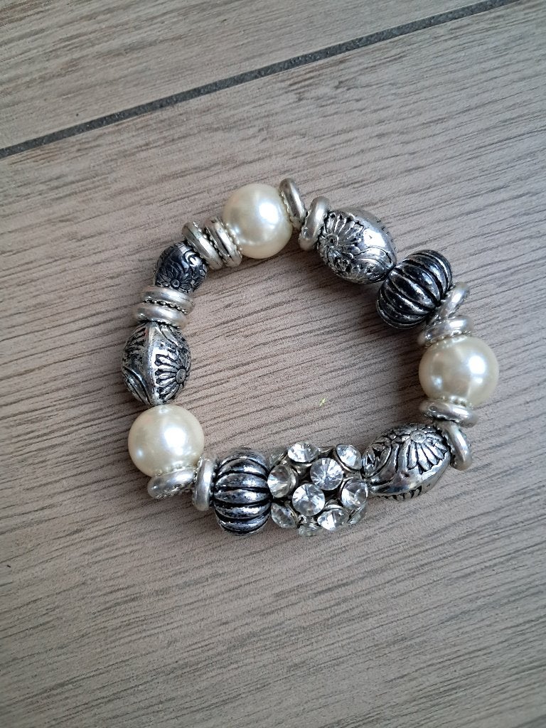 N05 Armband, Sieraden, Tassen en Uiterlijk, Armbanden, Gebruikt, Kunststof of Plastic, Ophalen of Verzenden, Met bedels of kralen