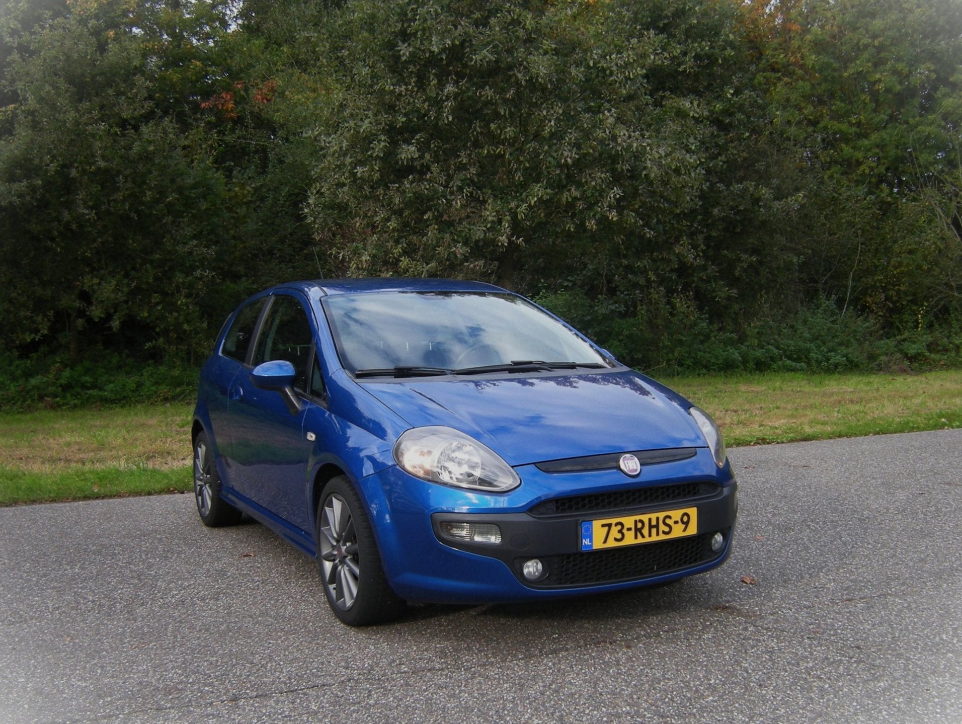 Fiat Punto Evo 1.4-16V Multiair Sport . 135 PK . Airco . Nav, Voorwielaandrijving, Gebruikt, Zwart, 4 cilinders