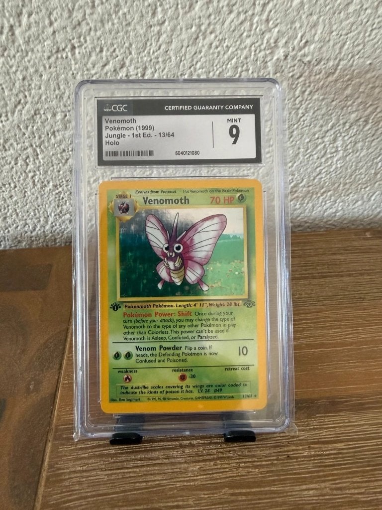 Pokémon | Venomoth | CGC 9 | 13/64 | 1st Edition, Ophalen of Verzenden, Zo goed als nieuw