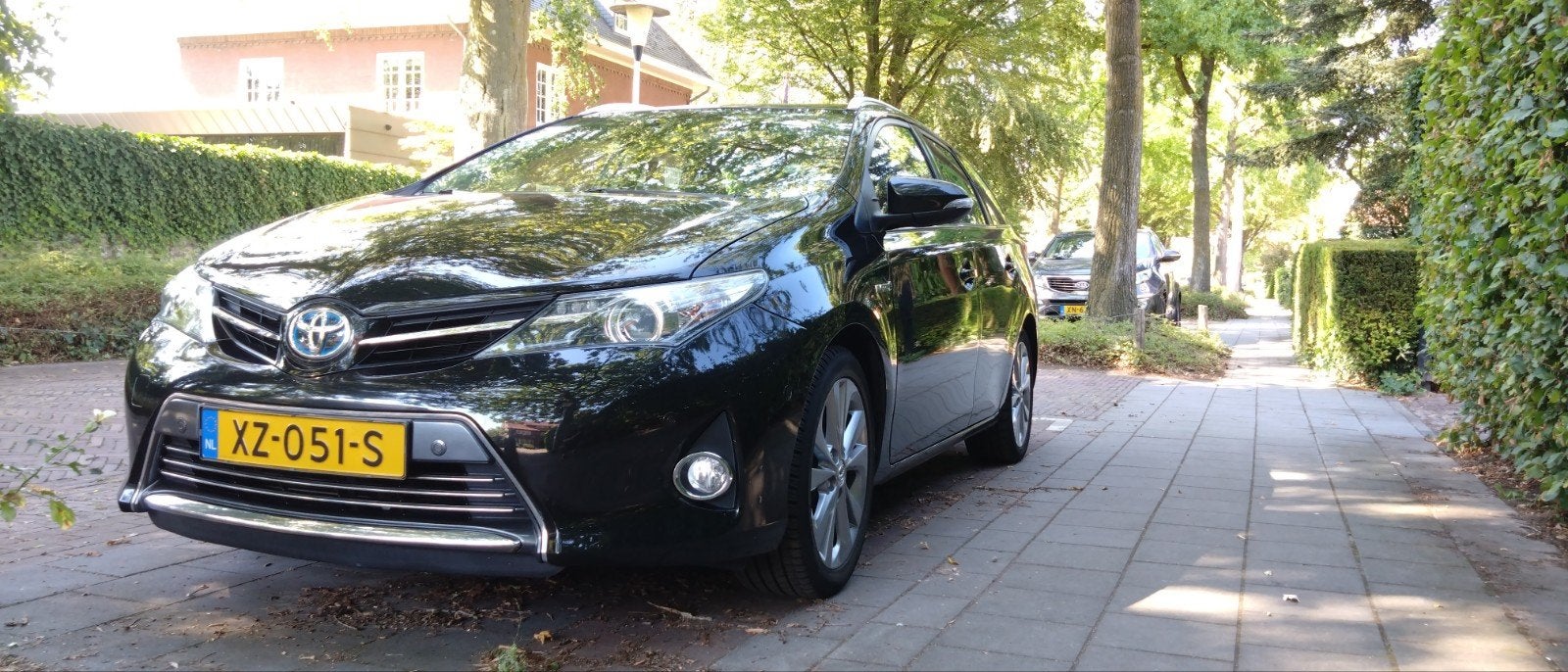 Toyota Auris 1.8 Hybrid Touring Sports CVT 2015 Zwart, Auto's, 345 kg, Zwart, 25 km/l, Te koop