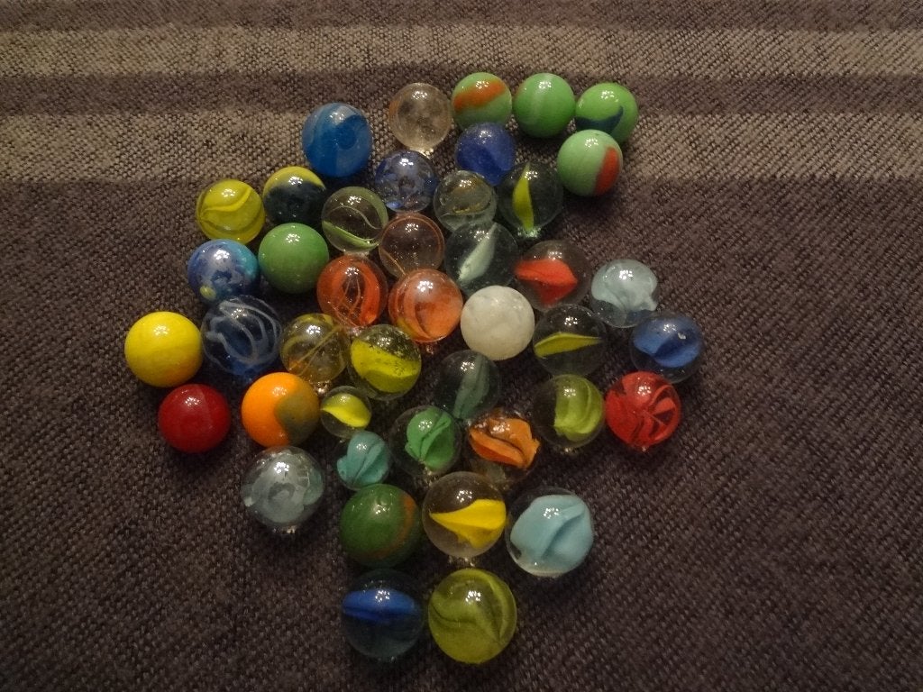 2 knikkerzak, knikkertas en losse knikkers, zie foto`s, Ophalen of Verzenden, Zo goed als nieuw