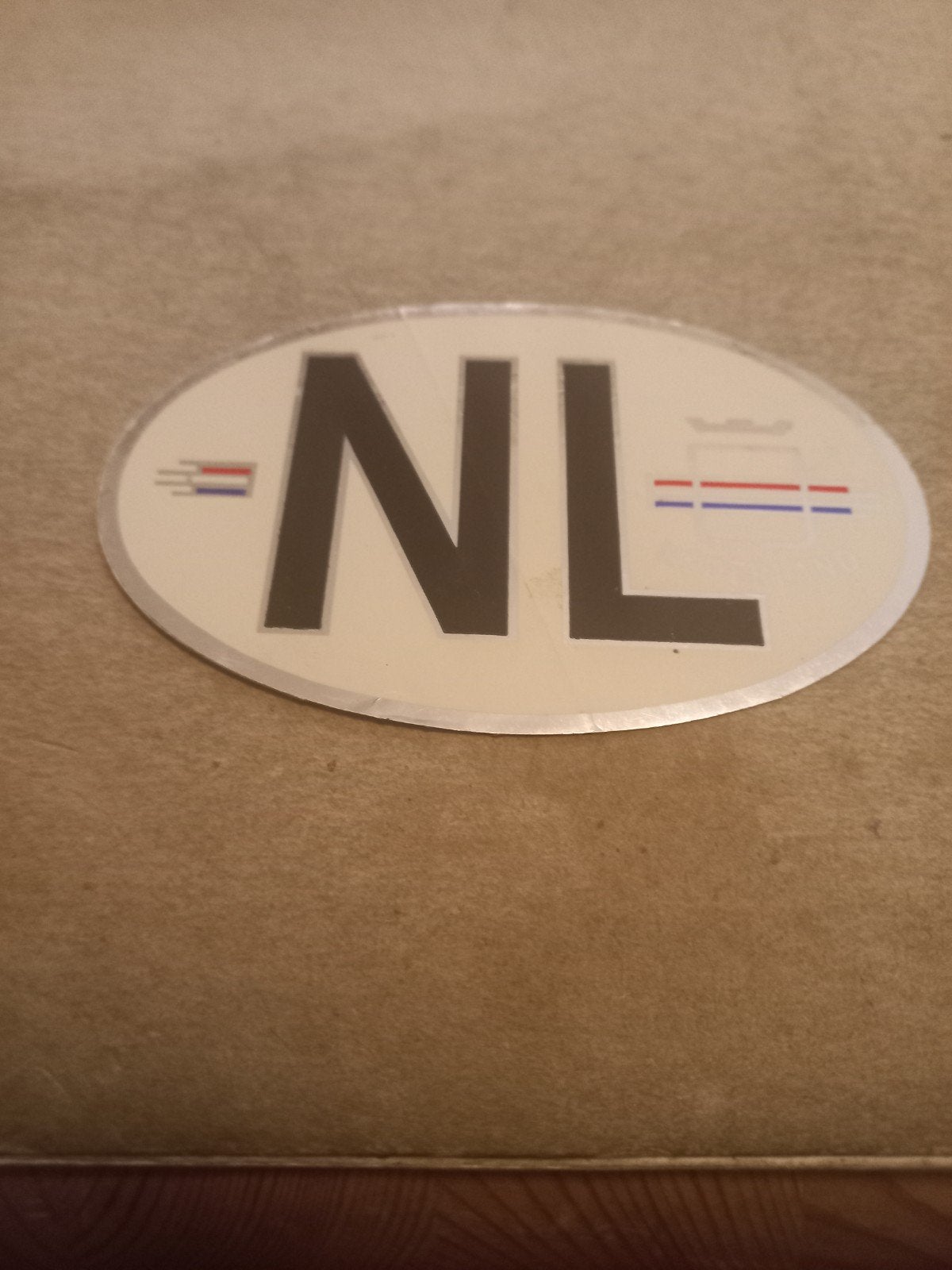 NL Ovaal Sticker - Auto Landcode Nederland, Ophalen of Verzenden, Gebruikt