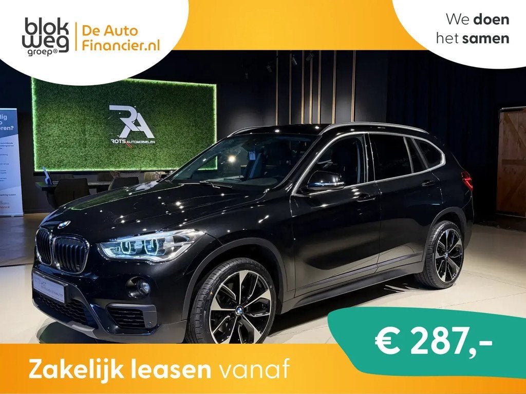 BMW X1 xDrive20i Exe Aut Navi|LED|Cruis|PDC|Cam € 17.450,0, 1998 cc, Stof, Gebruikt, Zwart