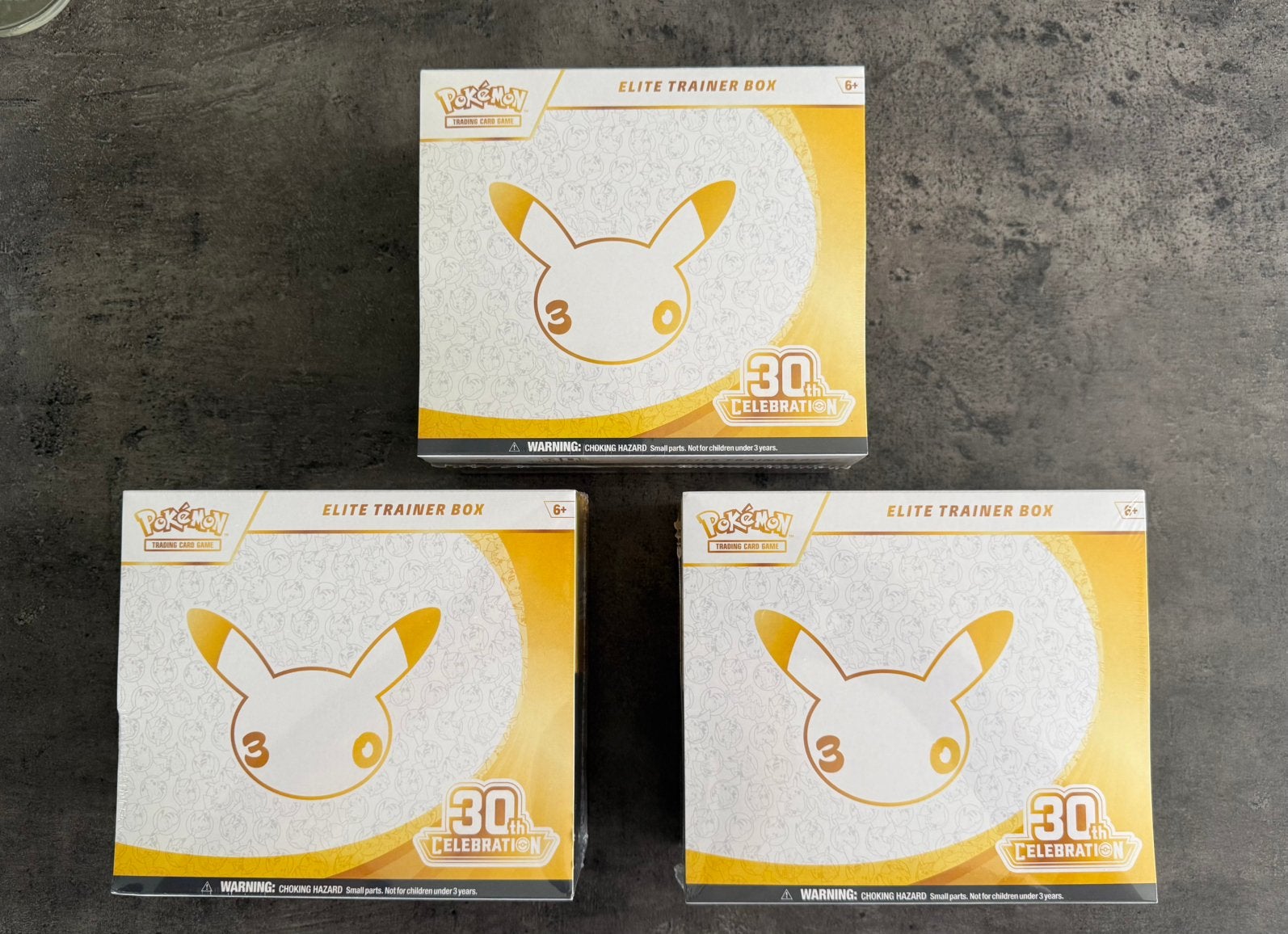 30th anniversary ETB’s - Pokémon, Ophalen of Verzenden, Nieuw, Boosterbox, Foil