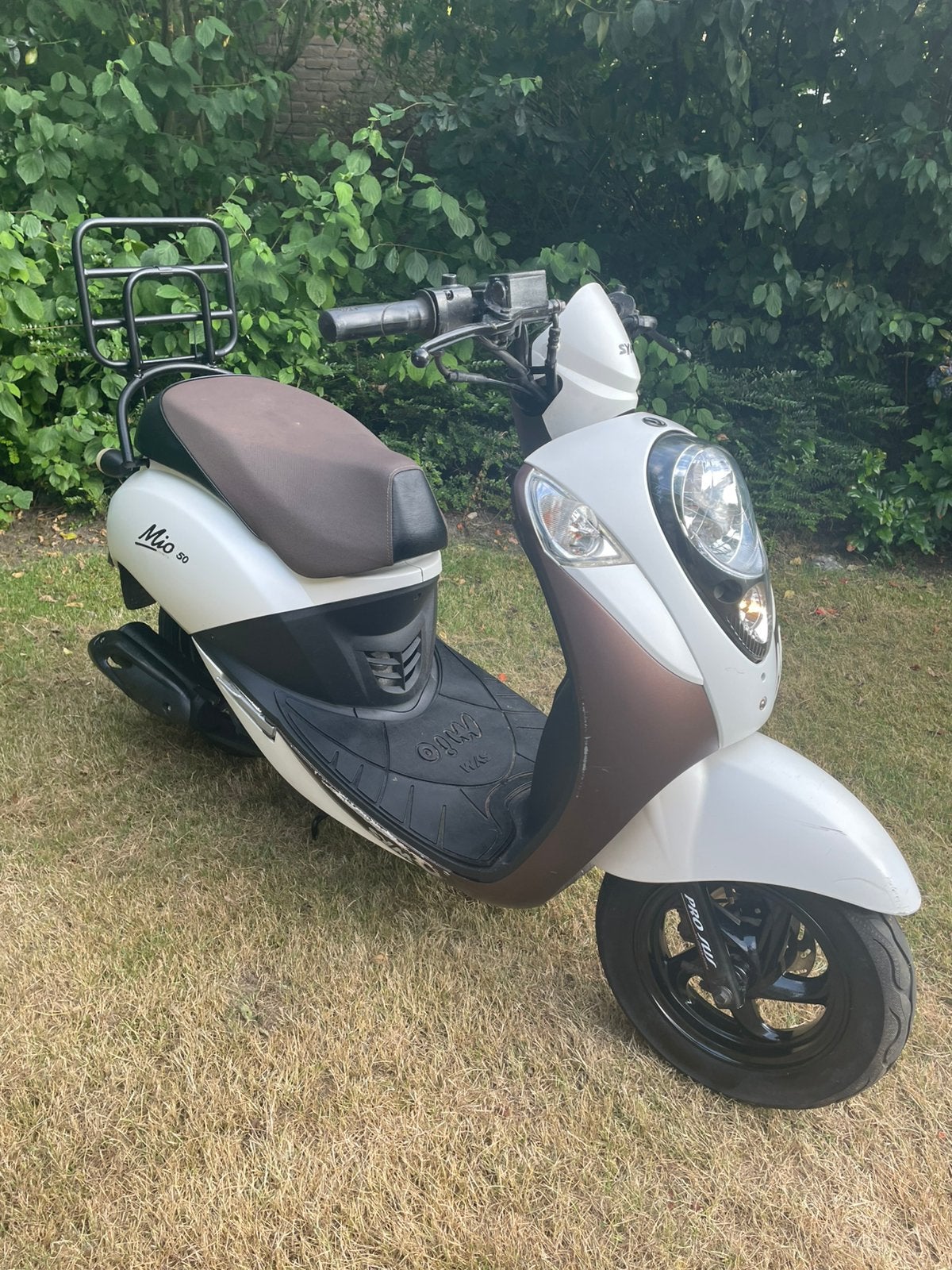 2014 Sym mio brom, Ophalen, Gebruikt, Maximaal 45 km/u, Benzine