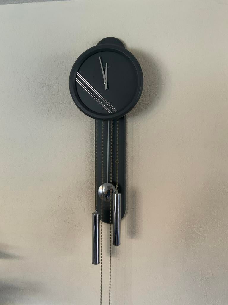 Wandklok Warnink met slinger en gewichten, Ophalen