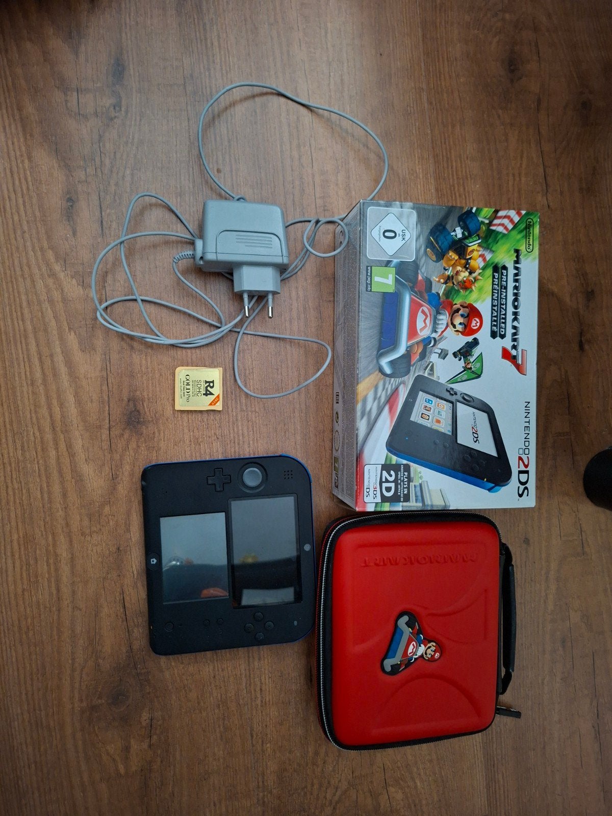 Nintendo 2DS met Mario Kart 7 en beschermhoes, Met games, Blauw, 2DS, Ophalen of Verzenden