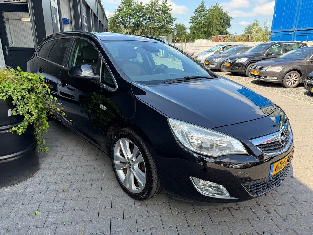 Opel Astra Sports Tourer 1.4 Turbo Cosmo, Voorwielaandrijving, Euro 5, Stof, Gebruikt