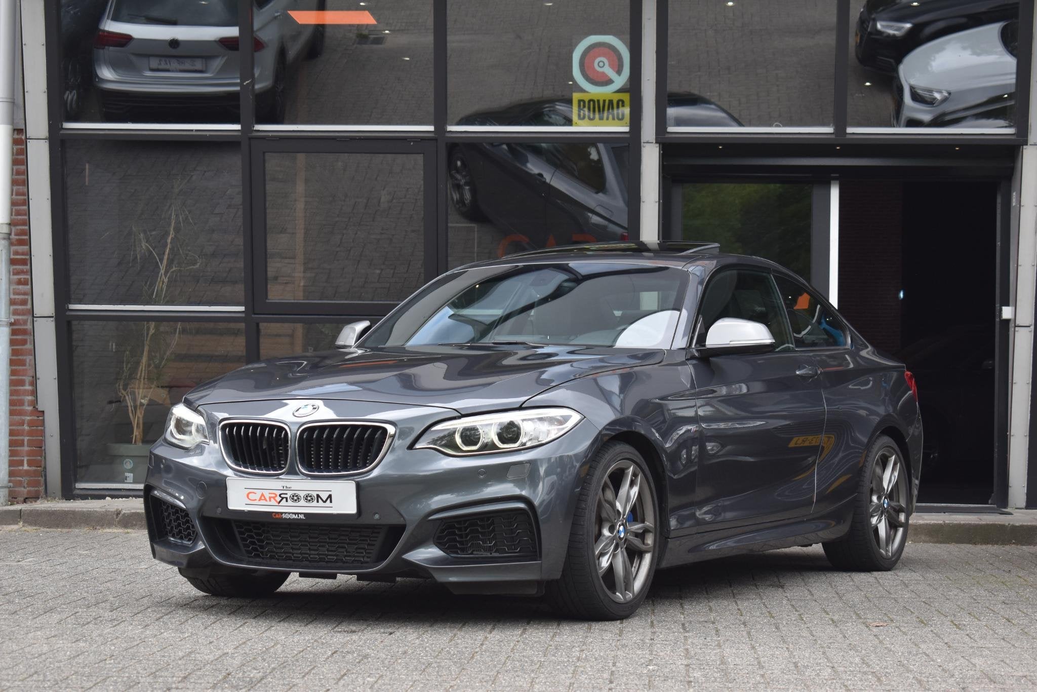 BMW 2-serie Coupé M235i High Executive Keyless Pano H/K Cam, Dealer onderhouden, Achterwielaandrijving, Gebruikt, Met garantie (alle)