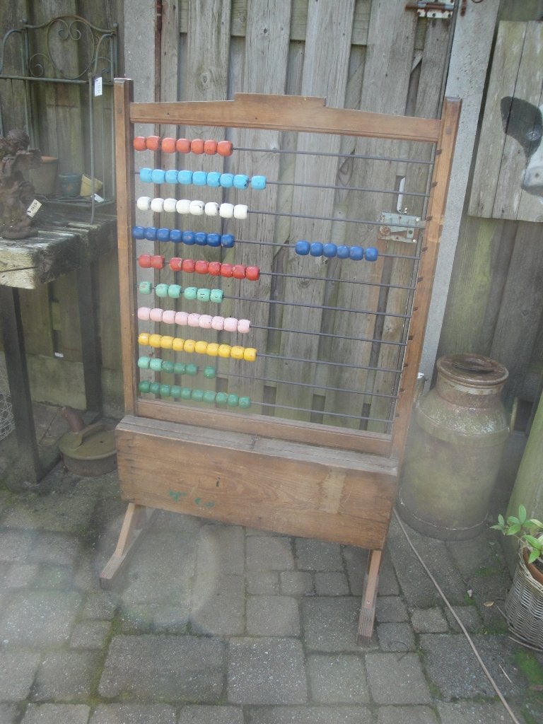 heel groot antiek telraam, Ophalen
