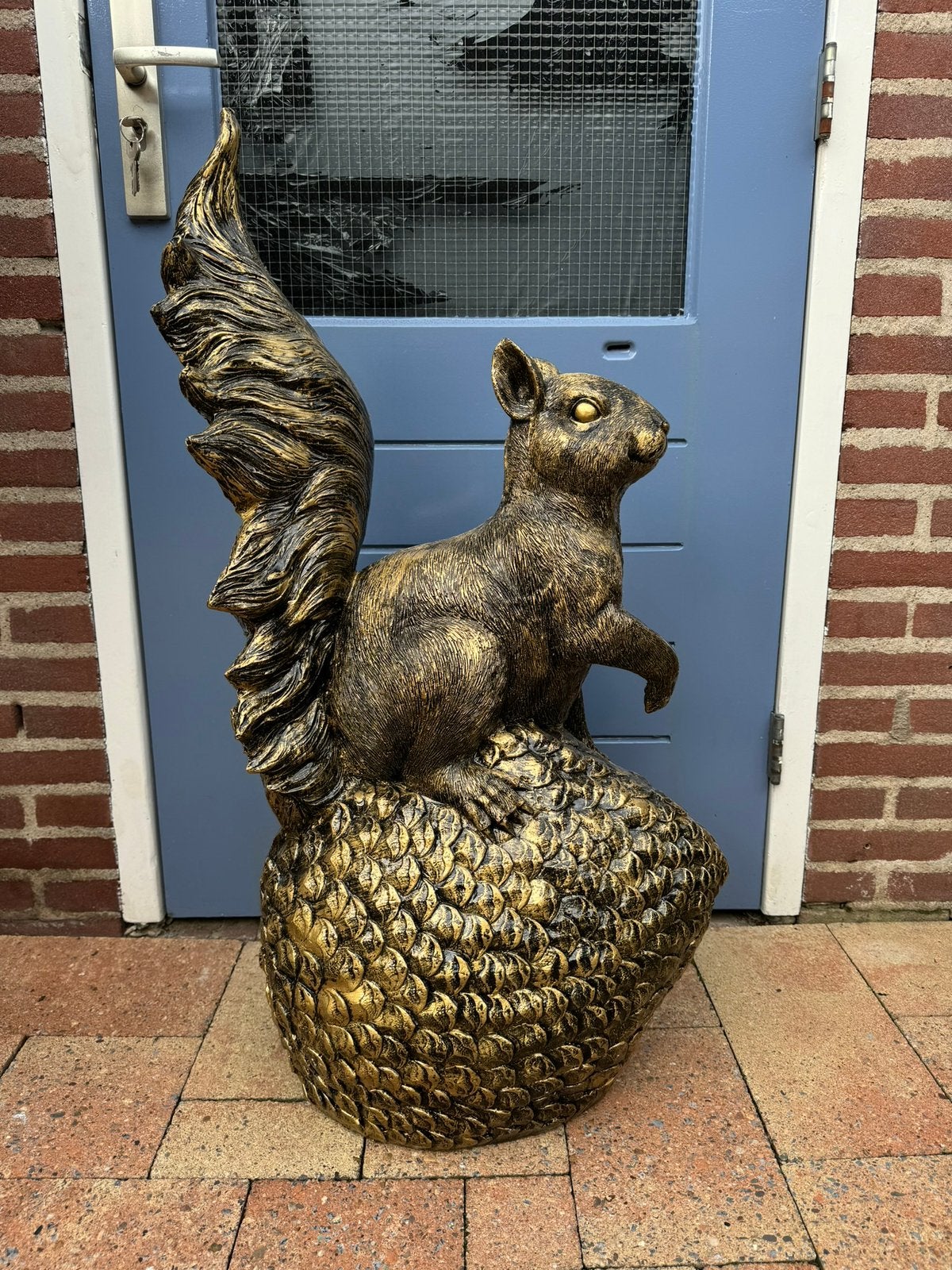 eekhoorn (goud/zwart) 97hoog 50breed 30diep/Nieuw!, Ophalen, Nieuw
