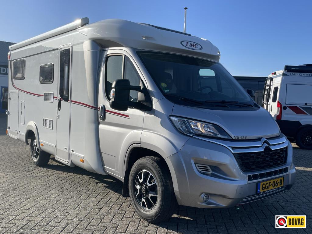 LMC Breezer V 643 G SCHOTEL/TV/FIETSLIFT/NAVI, Caravans en Kamperen, Campers, Standaard zit, Ringverwarming, Fiat, Koelkast
